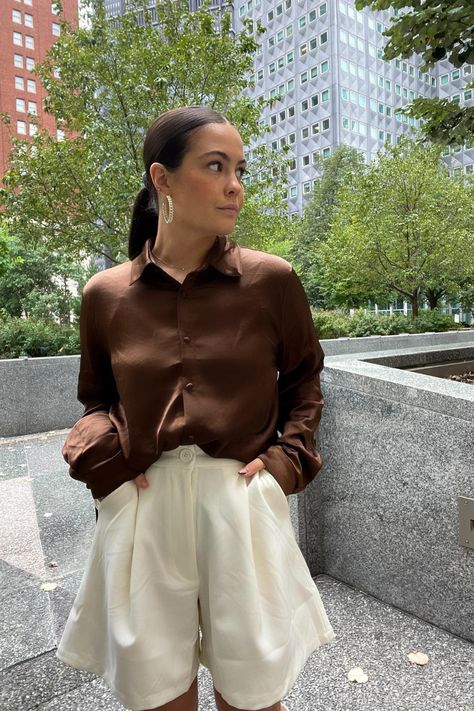 Brown silk top: Princess Polly Cream shorts: WeWoreWhat Earrings: Rent the Runway Brown Silk Top Outfit, Silk Top Outfit, Outfit For Fall, Cream Shorts, Beige Shorts, Brown Outfit, Brown Silk, Rent The Runway, Silk Shirt