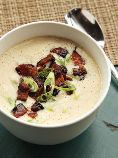 Creamy Cauliflower and Bacon Soup Recipe | Cauliflower gets a flavor-packed, smoky jolt from bacon in this creamy, comforting soup. It's simple to make and reheats beautifully. #holidays #christmas #christmasrecipes #christmasinspo #seriouseats #recipes Cauliflower Bacon Soup, Bacon Soup Recipes, Christmas Soup, Recipe Cauliflower, Cheesy Potato Soup, Creamy Cauliflower Soup, Comforting Soup, Bacon Soup, Winter Cooking