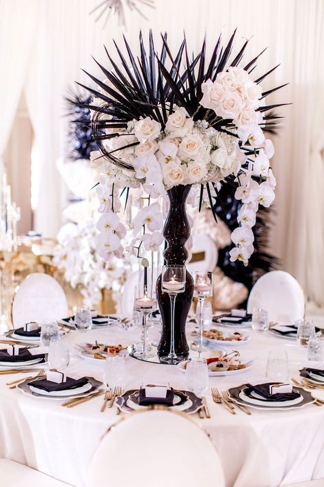 real wedding photo modern glam edgy wedding style black and white wedding decor hotel bel-air unique reception centerpiece black vase and palm fronds white flowers Black And White Ball Centerpieces, Edgy Centerpieces, Black Floral Centerpieces, Wedding Centerpieces Black And White, Centerpieces Black And White, Wedding Centerpieces Black, Black And White Centerpieces, Wedding Photos Inspiration, Modern Glam Wedding