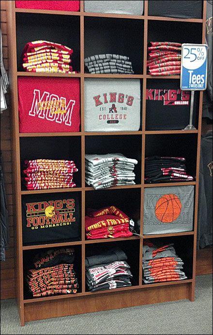 To me the best T-shirt merchandising allows use of the T-shirt graphic itself, and not extra, printed signage. Here is a very efficient example of T-Shirt Display in a Back-to-College setting, with… Clothes Shop Display, T Shirt Display, Gift Shop Displays, Ideas For Clothes, Vendor Booth Display, T-shirt Display, Craft Show Booths, Stand Feria, Clothing Store Displays