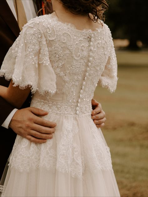 Light champagne Ivory lace dress with butterfly sleeve and boat neckline.

#modestweddingdress #myamazingweddingdress #custommademodestgown #custombridalgown Modest Wedding Dress, St George Utah, Ivory Lace Dress, Pretty Wedding Dresses, Butterfly Sleeve, Modest Wedding, Sleeve Wedding Dress, Modest Wedding Dresses, St George