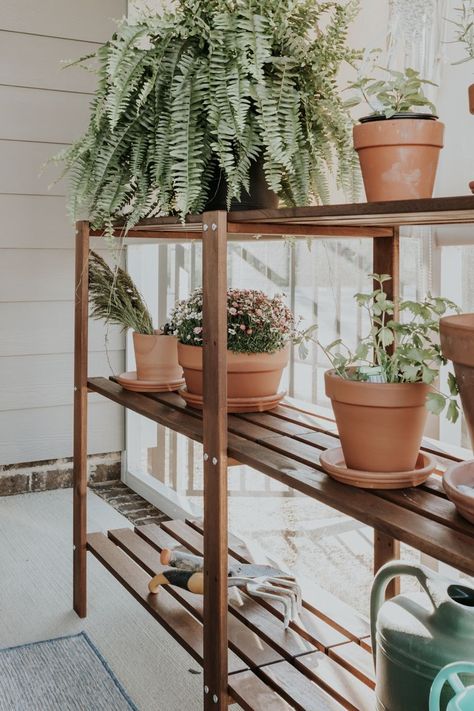 An easy IKEA potting table hack.  See how I turned an IKEA shelving unit into a simple potting bench for planting herbs and flowers. Ikea Plant Stand, Plant Shelves Outdoor, Ikea Shelving, Ikea Garden, Ikea Shelving Unit, Flowers Balcony, Ikea Plants, Ikea Regal, Ikea Outdoor