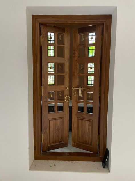 Pooja Room Door Designs Woods, Pooja Room Gate Design, Kerala Pooja Room Designs, Kerala Style Pooja Room Design, Double Door Pooja Room Design, Door Design For Pooja Room, Puja Room Door Design Wood, Doors For Pooja Room, Wooden Pooja Door Design