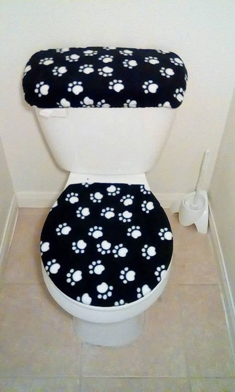 "Black & White PAW PRINTS Fleece Toilet Seat Cover Set Handcrafted from soft fleece and elastic that creates the perfect fit. Due to the cut of the fabric each set may vary slight from the picture in this listing. Our \"Toilet Seat Cover Sets\" will fit both Standard and Elongated Toilets (16\" X 14\" to 18\" X 14\"). Machine Washable or wipe off with a damp cloth. Makes a great gift!" Remove Bleach Stains, Disney Bathroom, Chic Bathroom Decor, Bathroom Crafts, Bathroom Decor Colors, Bathroom Decor Apartment, Bathroom Decor Ideas Colors, Small Sewing Projects, Toilet Seat Cover