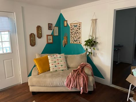 A simple but effective update to a small corner of my living room! Just a sample of paint and wall decor I thrifted turned this corner into my favorite place in my house! #colorblock #boho #livingroomideas #livingroomdesign #corner #loveseatlivingroom Living Room Corner Wall Mural, Corner Accent Wall Paint Ideas, Feature Corner Wall Paint, Artwork Corner Wall, Corner Room Paint Ideas, Painting Corner In Living Room, Accent Corner Paint, Corner Wall Decal, Corner Paint Ideas