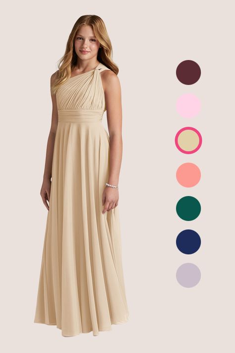 Charlize will make every junior bridesmaids feel like a modern Grecian goddess! The asymmetrical bridesmaid dress features delicately pleated panels and a twisted knot shoulder detail. The structured bodice is beautifully balanced with a softly gathered A-line skirt. Asymmetrical Bridesmaid Dress, Junior Girl Dresses, Junior Bridesmaids, Champagne Bridesmaid Dresses, Grecian Goddess, Star Wars Wedding, Junior Bridesmaid Dress, Maid Dress, Junior Bridesmaid Dresses