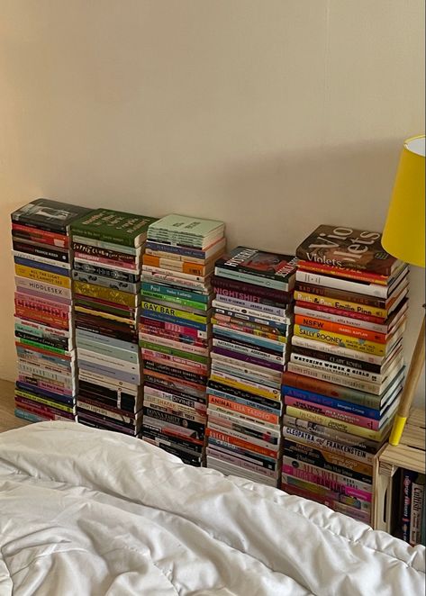 book stacks bedroom Book Stack On Floor, Books Stacked On Floor Bedroom, Book Stacks Aesthetic Bedroom, Books On The Floor Aesthetic, Books Stacked On Floor, Books Decoration, Vintage Apartment Decor, Bedroom Book, Colourful Living Room Decor