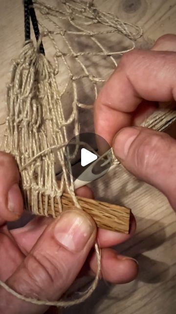 Johnny Juhl on Instagram: "Part 2: How to create a fine mesh net. 🪡🧵🐟
The little reel should be pretty self explanatory - if not feel free to ask in a comment. 
The tiny little antler net-needle I made in the previous reel works great. The tiny mesh net was easier to make than I expected as well. The skill of net making is very useful in so many situations outdoors; fishing (also for bait), attaching extra stuff to your rucksack, mesh-bag for foraging, overhanging mesh shelf for drying clothes in your tent or tarp, various traps, hammocks etc. etc. Once you “get it into your hands” I imagine it’s a bit like knitting - repeating the same knots again and again. Go under and into the next mask, pull tight until the bend reaches the edge of the measure-bar,- pinch it with your thumb, throw How To Make A Net Bag, Diy Fishing Net How To Make, How To Make A Fishing Net, Net Making Tutorials, How To Make A Net, Macrame Netting, Diy Fishing Net, Net Making, Mesh Shelf