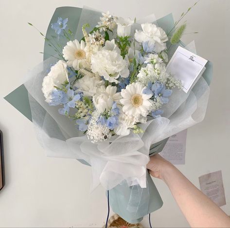 White And Blue Flowers Aesthetic, Green And Blue Flower Arrangements, Grad Flowers Bouquet, Light Blue Flower Bouquet, Baby Blue Bouquet, Flower Bought, Light Blue Bouquet, Grad Bouquet, Blue And White Bouquet