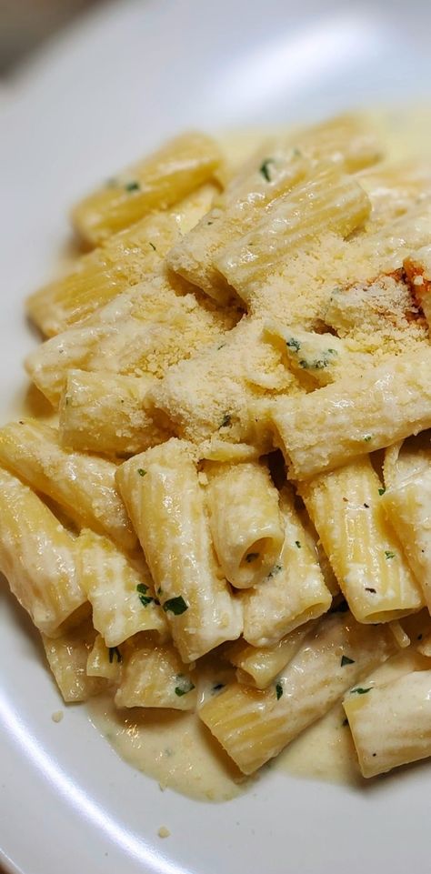 Rigatoni with Pecorino Cheese Sauce Ingredients: 1 lbs rigatoni pasta 2 tblsp Unsalted butter 1 tsp Garlic paste Salt and pepper to taste 8 oz grated Pecorino Romano cheese Fresh chopped parsley 3 cups Heavy cream 1 large Egg beaten Instructions: In a pot of boiling water add some salt to taste, vegetable oil and […] Romano Cheese Recipes, Pecorino Pasta, Spicy Potato Wedges, Rigatoni Noodles, Cheesy Pasta Recipes, Sausage Ragu, Rigatoni Recipes, White Bean Soup Recipes, Easy Family Recipes