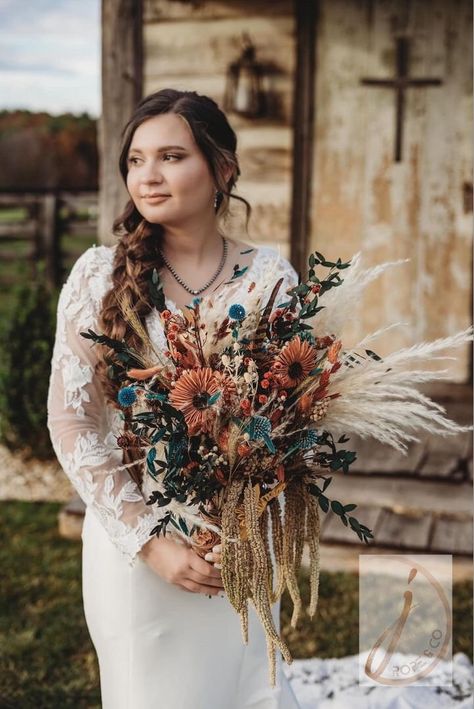 Embrace the charm of a rustic Western wedding with our boho bridal bouquet, expertly crafted as a Western dried flower bouquet. Perfect for a boho Western wedding, this dried bouquet is an ideal choice for the rustic Western bride seeking a timeless and natural elegance.  🪶 KEY DETAILS: This listing in for the main photo bouquet  3 options for your perfect boho, chic western wedding - Bride's bouquet, bridesmaids rope hoop bouquet, or groom boutonniere  Made with high-quality dried florals to m Rope Wedding Bouquet, Western Flowers Wedding, Western Wedding Flowers Bridal Bouquets, Western Wedding Bouquet, Western Wedding Bouquets, Western Wedding Flowers, Western Bouquet, Classy Western Wedding, Fall Western Wedding