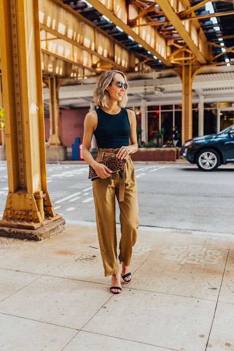 These paper bag pants and black tank make for a cute work outfit or date night outfit. Pair it strappy sandals and a leopard clutch #summerstyle #blacktank #paperbagpants Bag Pants Outfit, Paper Bag Pants Outfit, Paper Bag Jeans, Spring Challenge, Cutest Clothes, Paperbag Hose, Paper Bag Pants, Paper Bag Waist Pants, Bag Pants