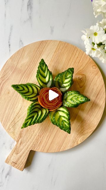 Weenussanun Homhuan on Instagram: "How to make Cucumber Leaf 🥒 Save this for later & share with friends 💚 If you are wondering how to make the Carrot Rose please check out my other reel to see how to mak it🥕 LINK IN MY BIO to shop the peeler and the knife 🤍 Wishing you a wonderful and peaceful week ✨ @inspo_by_rio_ 💕 Repost from last year 🌿 . #cucumber #veggiecarvings #fooddecoration #foodart #foodinspiration #foodstyling #foodcarving #videohacks" Cucumber Charcuterie, Cucumber On Charcuterie Board, Cucumber Roses How To Make, Cucumber Decoration, Cucumber Art, Cucumber Rose, Charcuterie Business, Cucumber Flower, Salad Decoration