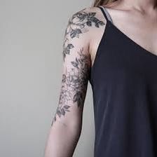 Floral Wrap Around Tattoo Upper Arm, Spaced Out Sleeve Tattoo Women, Flower Wrap Around Tattoo Upper Arm, Floral Inner Arm Tattoo, Upper Arm Wrap Tattoos For Women, Floral Half Sleeve Tattoo Upper Arm, Wrap Around Bicep Tattoo Women, Inner Upper Arm Tattoos For Women, Floral Upper Arm Tattoo