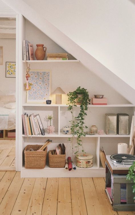 Shelves On Angled Wall, Slanted Built In Bookshelf, Sloped Ceiling Shelves, Attic Built Ins Slanted Walls, Slanted Walls Decor, Attic Lounge Ideas, Angled Bookshelf, Sloped Ceiling Storage, Sloped Wall