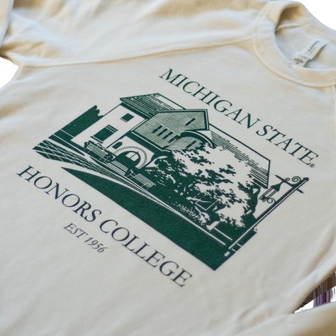 This sweatshirt has a vintage look and fleecy feel. Available in the color natural, it has a dark green imprint of historic Eustace-Cole Hall and features the text “Michigan State University”, “Honors College”, and “Est 1956”. 52% cotton/48% polyester Machine wash cold gentle Available in natural Unisex sizing Made in USA College Club Merch Ideas, College Merch Ideas, College Spirit Wear, Dark Green Crewneck, Honors College, School Merch, School Department, College Club, Tee Ideas