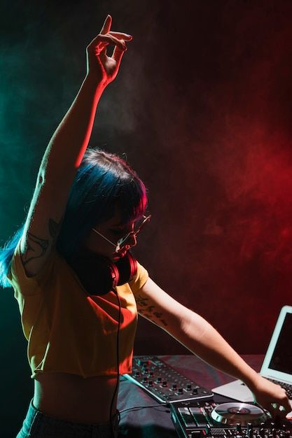 Premium Photo | Front view female dj living through music played Female Dj, Top Dj, Best Dj, Professional Dancers, Music Composers, Dj Equipment, Music Director, Wedding Dj, Music Genres