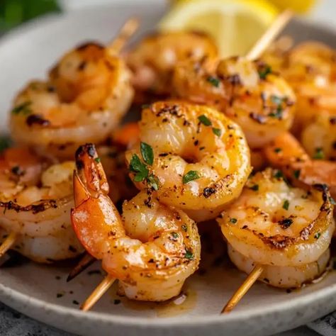 Grilled shrimp skewers are a perfect summer dish, offering light yet satisfying bites packed with flavor. Whether you’re hosting a backyard BBQ or looking for a quick and healthy dinner, ... Read more Shrimp Skewers Marinade, Shrimp Kabobs On The Grill, Shrimp Kabobs, Grilled Shrimp Skewers, Teriyaki Glaze, Shrimp Skewers, Fish Recipes Healthy, Glazed Chicken, Summer Dishes