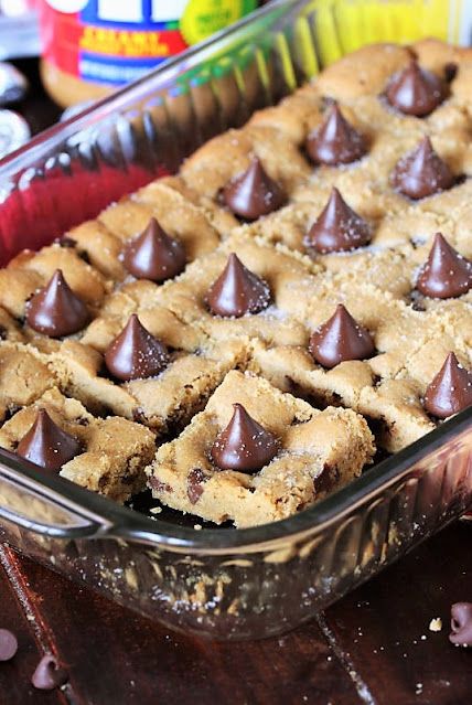 Peanut Butter Blossom Cookie Bars, Peanut Butter Cookie Dough Bars, Cookie Butter Desserts Easy, Pretty Desserts For A Crowd, Sheet Pan Peanut Butter Blossoms, Easter Bar Recipes, But Goodie Bar, Peanut Butter Blossoms Bars, Sheet Pan Peanut Butter Bars