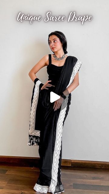 𝐀𝐫𝐜𝐡𝐞𝐞 | Saree Drapes on Instagram: "Save and send this unique saree draping tutorial to a saree lover 🖤

Saree of the day- draped a stunning pure mul cotton in deep black contoured with white lace and cute tassels.

Paired it with a black cropped top, braided my hair and added junk jewellery. (choker, and nosepin)

Cottons are so pretty but can’t always style them plain so I decided to do a chic drape and now I can’t unsee this wholesome beauty.

How to wear a saree as a beginner-
🖤 Pick lightweight pure silk sarees fabric like katan silk, tussar silk, mysore silk, mulberry silk, khaddi chiffon, Khaddi Georgette, gajji silk, assam silk and pure cotton.
🖤 Choose a contrasting design blouse. Refer to pinterest for blouse design ideas.
🖤 Start by wearing your heels or any footwear Georgette Saree Draping Styles, Chiffon Saree Draping Styles, Modern Saree Draping Styles, Plain Sarees With Contrast Blouse, Unique Saree Draping, Modern Saree Draping, Saree Draping Tutorial, Drape Skirt Pattern, Blouse Design Ideas