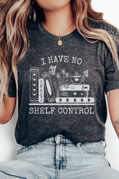 A playful shirt with a graphic of a bookshelf filled with books and butterflies. The shirt humorously reads "I have no shelf control" in a lively font. It's a no shelf control shirt, ideal as a bookworm gift, a librarian reading shirt, or a book lover's gift. The design caters to bookish individuals, including book nerds and members of book clubs. Book Lovers Shirt, Reading T Shirts, Book Lover Shirt Ideas, Book Themed Shirts, I Have No Shelf Control, Book Shirts Funny, Book Shirt Design, Shirts About Books, Bookish Shirt Ideas