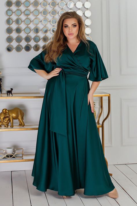 "Gorgeous women's flared wrap dress made of delicate silk. A flared skirt on the floor adds elegance along with a bell sleeve sleeve complements the look and makes it elegant. The special appeal of this dress in the correct patterns for plus size. The dress can be made in any silk color you wish. Full Wrap Flared skirt Flutter Sleeve V- neck Floor Length 7 meters of fabric Sizes: S,M,L,XL INCH S bust 33.8\"-37.7\" waist 25.9\"-29.9\" M bust 37.7\"-45.7\" waist 29.9\"-35.4\" L bust 45.7\"-49.2\" Plus Size Satin Dress, Popular Fall Outfits, Green Silk Dresses, Summer Formal Dresses, Velvet Slip Dress, Closet Tour, Emerald Green Dresses, Plus Size Bridesmaid, Satin Evening Dresses