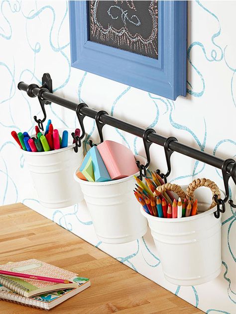 Available from Ikea -- DIY Version: Install a towel rod with sliding hooks.  Hang small buckets on the rod to organize craft supplies! Diy Rangement, Dollar Store Diy Organization, Dorm Room Diy, Pantry Makeover, Towel Rod, Dollar Store Organizing, Dekorasi Kamar Tidur, Store Organization, Kitchen Projects