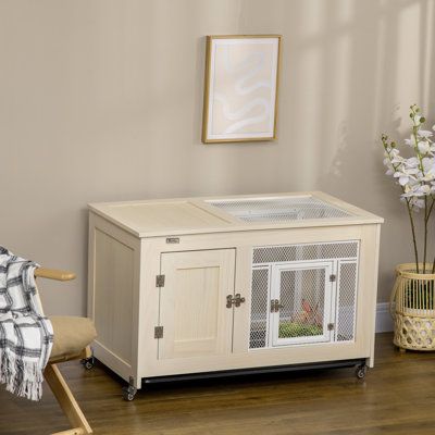 If you can't decide what room you want your bunny in, this rolling design lets you wheel them wherever want them to be and avoid heavy lifting. The indoor rabbit cage from Tucker Murphy Pet™ has a combination of darkness and light, catering to a bunny's natural desire to sleep in the shade. We offer convenience for you, and comfort for your pet. | Tucker Murphy Pet™ Daryann Rabbit Hutch Solid Wood (common for Rabbit Hutches) in Brown / White | 24.5 H x 37.5 W x 20.75 D in | Wayfair Indoor Rabbit Cage, Rabbit Hutch Indoor, Hutch Furniture, Bunny Cage, Rabbit Habitat, Bunny Hutch, Darkness And Light, Pig House, Indoor Rabbit