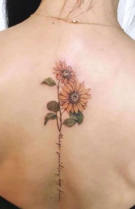 Back Sunflower Tattoo Sunflower Back Tattoo, Sunflower Foot Tattoos, Sunflower Mandala Tattoo, Floral Back Tattoos, Happiness Tattoo, Sunflower Tattoo Sleeve, Sunflower Tattoo Shoulder, The Trend Spotter, Beautiful Flower Tattoos