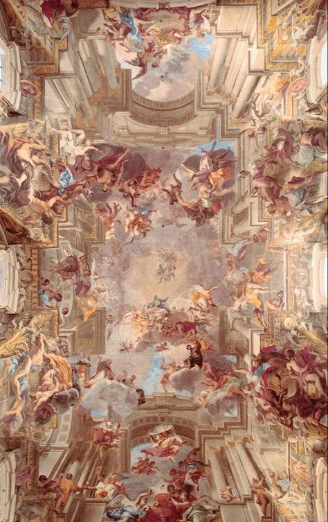 The frescoes adorning the ceiling of the **Chiesa di Sant'Ignazio di Loyola** in Rome are one of the most spectacular works of Baroque art. Painted by **Andrea Pozzo** between 1685 and 1694, they exemplify masterful illusionistic perspective.

The central element of the painting is the **apotheosis of St. Ignatius of Loyola**, the founder of the Jesuit order. The saint is depicted ascending toward heaven, surrounded by angels and other saints. The illusionary dome, though not actually present, creates the impression of a vast space, as if the sky is opening above the faithful.

Pozzo used the technique of **quadratura**, which, through precise manipulation of linear and atmospheric perspective, makes the architecture of the church seamlessly blend into the heavenly vision. Around St. Ignat Carravagio Paintings Baroque, Carravagio Paintings, Surrounded By Angels, Ignatius Of Loyola, Atmospheric Perspective, St Ignatius Of Loyola, Baroque Painting, St Ignatius, Cathedral Wedding