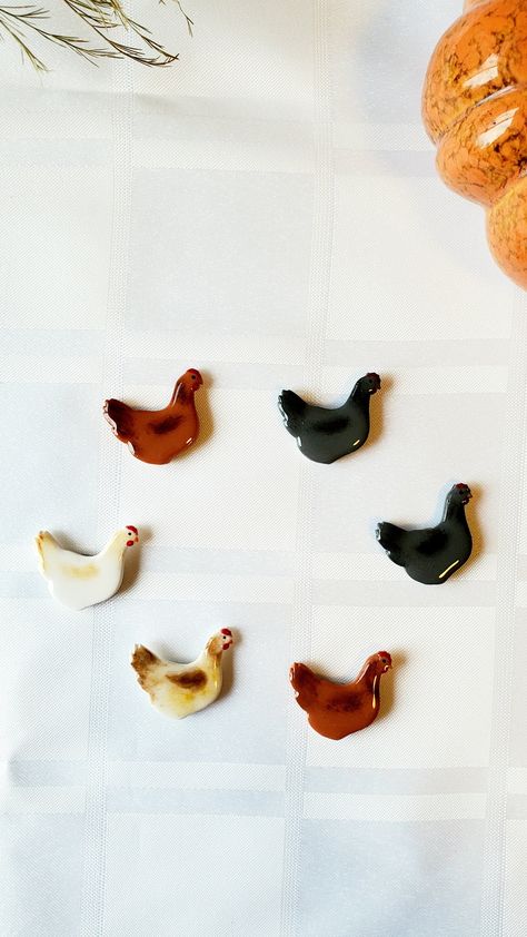 These handmade magnets are a perfect gift for a chicken lover or to add to your own chicken collection! They come in sets of 3 (white, orange and grey chicken). Each chicken is covered in UV resin to give shine and durability. Proudly made in Annapolis Valley, Nova Scotia, Canada *I can make these into backpack pins as well *Please read before purchase* As they are handmade they will have slight imperfections and slight clay colour or shading of chicken wings/tail variation from what's shown in Chicken Magnet, Air Dry Clay Magnets, Clay Chicken, Clay Fridge, Handmade Magnets, Polymer Clay Magnet, Easy Polymer Clay, Annapolis Valley, Clay Magnets