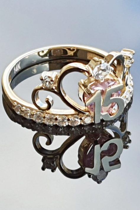 A girl can never have too much jewelry, so let's kick off our list of 15 gorgeous quinceanera gifts with this stunning crown ring. It will look absolutely amazing on the birthday girl's finger and is a gift that she will cherish forever. Silver Quince Rings, 15 Quinceanera Ring, Quinceanera Rings Birthstone, Rings For Quince, Quinceanera Rings Silver, Quincenera Rings 15, Pink Quince Ring, Sweet 15 Rings, Quince Rings 15 Gold