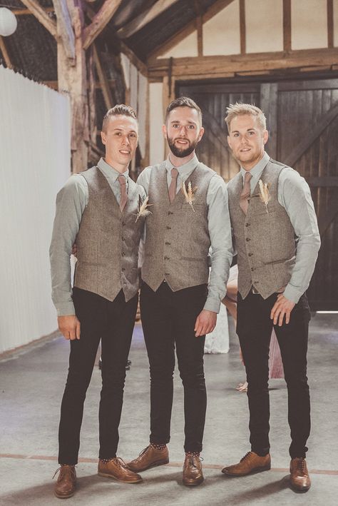 Groom and groomsmen wear tweed waistcoats and black jeans for an informal rustic wedding | Photography by http://www.michellelindsell.com/ Tweed Clothing, Unique Rustic Wedding, Wedding Vest, Fall Barn Wedding, Wedding Waistcoats, Rustic Wedding Photography, Mens Waistcoat, Tweed Waistcoat, Tweed Vest