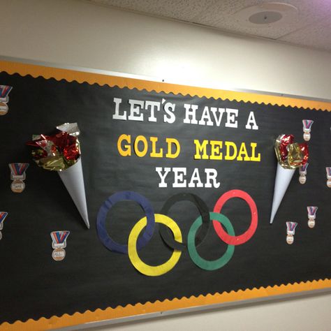 Olympic themed room this year! Olympic Bulletin Board, Sports Bulletin Boards, Physical Education Bulletin Boards, Pe Bulletin Boards, Olympics Decorations, Sports Theme Classroom, Olympic Theme, Ra Bulletin Boards, Olympic Rings