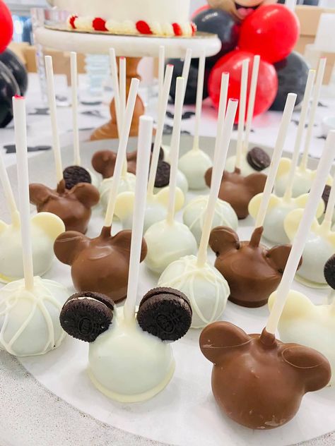 Mickey Mouse themed cake pops for my son’s first birthday party! Mickey Mouse Safari Food Ideas, Mickey Mouse Theme Desserts, Mickey Mouse Snack Table, Mickey Mouse Birthday Desserts, Mickey Mouse Treats For Birthday Party, Mickey Themed Food, Mickey Mouse Treat Table, Mickey Mouse Themed Food, Mickey Desserts