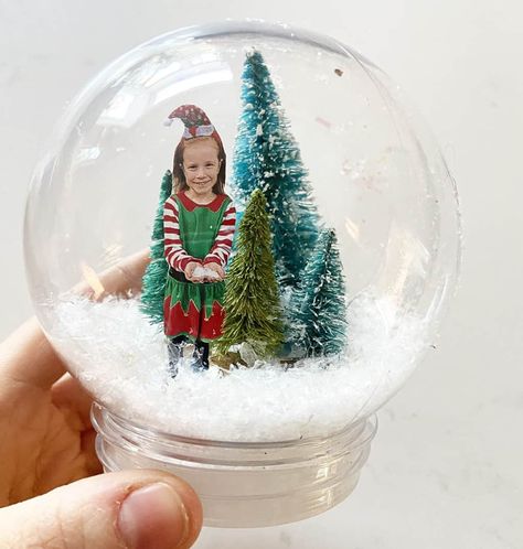 Kids Craft Snow Globe, Diy Snowglobe Ornament With Picture, Dollar Tree Snow Globe Ornament, Dry Snow Globes Diy, Kindergarten Snow Globe Craft, Custom Snow Globes, Mason Jar Snow Globe For Kids, Snow Globe With Picture Inside, Personalized Snow Globe