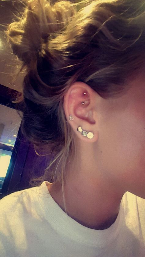 Third hole, cartilage, and rook. I love these piercings 3 Cartilage Piercing In A Row, Rookie Piercing, Third Hole Piercing, Lower Cartilage Piercing, Low Helix Piercing, Double Helix Piercing, Double Helix, Cool Ear Piercings, Tooth Gem