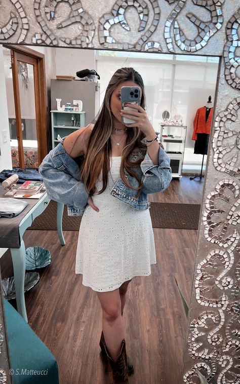 White sundress, oversized jean jacket, cowboy boots White Dress And Jean Jacket Outfit, White Dress Jean Jacket, Dresses With Cowboy Boots, Jean Jacket Outfits, Oversized Jean Jacket, Dress With Jean Jacket, White Sundress, Zach Bryan, Fashion Fits