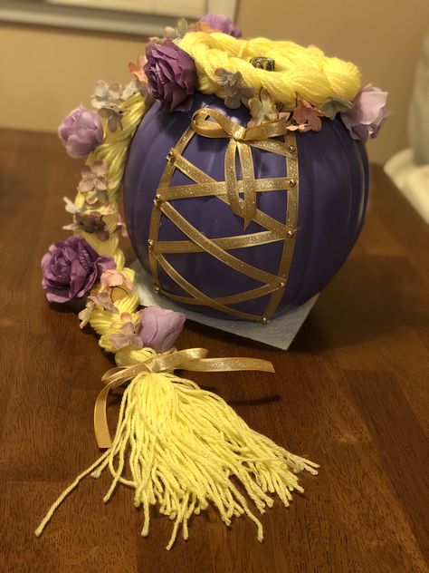 Rapunzel/Disney Tangled pumpkin painting and decorating Tangled Pumpkin Painting, Rapunzel Pumpkin, Painting Ideas Disney Princess, Tangled Pumpkin, Pumpkin Painting Ideas Disney, Painting Ideas Disney, Disney Pumpkin Painting, Story Book Pumpkin, Rapunzel Disney