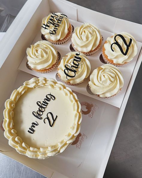 Who’s feeling 22? 🎉 Our simple bento box set is super elegant and cute! The perfect 5” little cake and 6x cupcake set! Comes in a range of colours, all you need to let us know is whats your message for your cake! check it out on our website www.qsbakery.co.uk #qsbakery #taylorswift #22 #foodie #love #bakery #londonbakery #summer #bentocake #setdesign #design #cakevideos #reels #reelitfeelit #cupcakes #vanillacake #foodgram @taylorswift #loveyourself #birthday #celebration #cakesdelivery... Bento Cake And Cupcakes Design, Bento Cake With Cupcakes Set, Bento Cake Simple, Bento Cake And Cupcakes, Simple Bento Box, Bento Cake Design, Simple Bento, Minimal Cake, 22nd Birthday Cakes