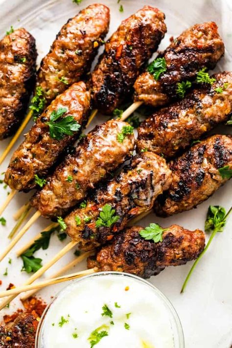 Grilled kebapi, similar to kebabs, are made with ground beef, pork, and lamb. This juicy and tender kabob meal is perfect for summer! Pork Kebabs, Lamb Kabobs, Pork Kabobs, Beef Kebabs, Weekly Menu Plan, Lamb Kebabs, Ground Pork Recipes, Macedonian Food, Grilling Kabobs