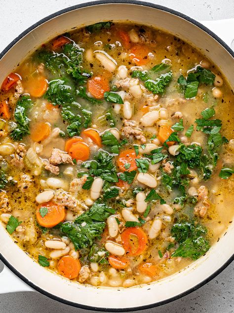 Kale and White Bean Sausage Soup - Sandra Valvassori Bean Sausage Soup, White Bean Sausage Soup, White Bean Sausage, Kale And Bean Soup, Bean Sausage, Kale And White Bean, Bean And Sausage Soup, White Bean Kale Soup, Sausage And Kale Soup