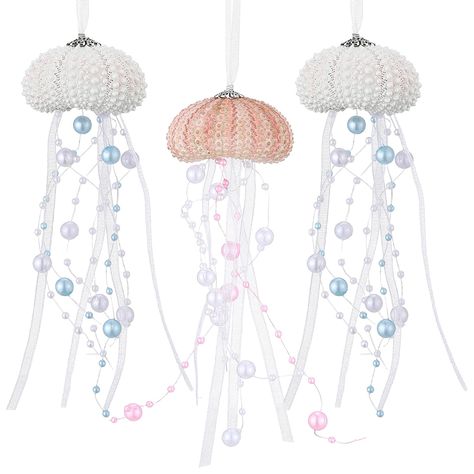 PRICES MAY VARY. Ocean Themed Hanging Decorations: you will receive 3 pieces of jellyfish decorations, which are decorated with clear crystal and ribbons, exquisite and lifelike; Distinctive styles and bright colors create delicate decorations for your home, office and festival Easy to Catch Your Sight: these coastal Christmas decorations are beautiful in shape and color, similar to natural creatures, creative and vivid in shape, exquisite and beautiful, adding more colors to your home; Please n Jellyfish Ornament Diy, Beach Themed Christmas Decor, Jellyfish Decoration, Beach Garland, Tropical Xmas, Winter Gala, Hanging Jellyfish, Jellyfish Decorations, Sea Urchin Shell