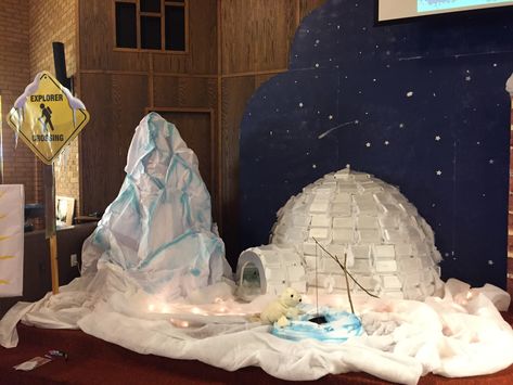 Operation Arctic VBS decor -crunched paper iceberg, styrofoam carry outs igloo (the support frame is cut from styrofoam sheets), styrofoam fishing hole. Arctic Decorations, Operation Arctic Vbs, Arctic Vbs, Penguins Project, Christmas Tree Festival, Polo Nord, School Holiday Party, Christmas Contests, Scholastic Book Fair