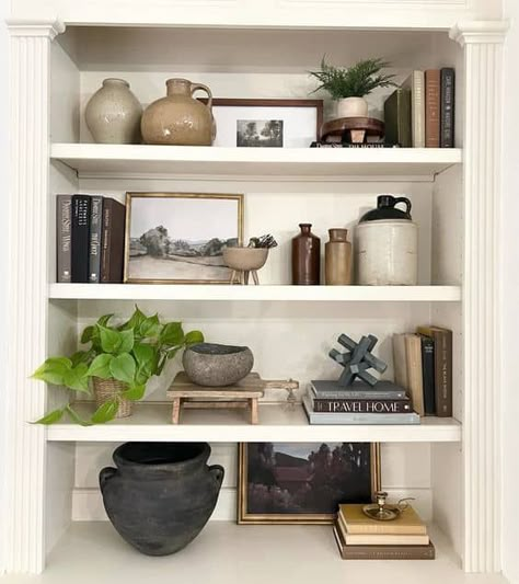 20 Transitional Shelf Styling Ideas » Lady Decluttered Picture Frame Styling Shelves, Home Office Shelf Styling, Vintage Vase Decorating Ideas, Office Shelf Decor Men, Book Case Styling Ideas, Amber Lewis Shelf Styling, Earthy Bookshelf Decor, Top Of Built Ins Decor, Modern Vintage Shelf Decor