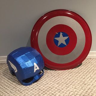 Stick This: DIY Captain America Shield from a Pizza Pan Captain America Shield Art, Diy Captain America Shield, Superhero Camp, Blue Spray Paint, Red Spray Paint, Diy Cosplay, Pizza Pans, Captain America Costume, Avengers Party