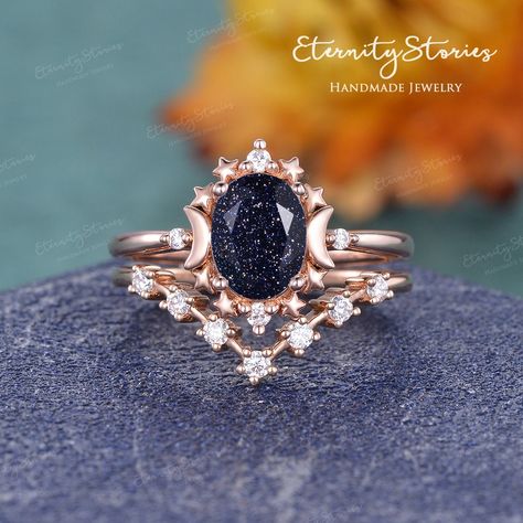 "Vintage Moon And Star Galaxy Crystal Wedding Set Blue Sandstone Engagement Ring Bridal Open Wedding Band Unique Celestial sparkly Ring Women ✧✧Jewelry detail✧✧ Item As Shown in Solid 14K Rose Gold Also available in white gold, yellow gold / Solid 14K & 18K ✦ Center stone: Blue Sandstone , oval Cut - Measure: 6*8mm ✦ Side stones: 0.2ct colorless moissanite or diamond(H SI) ✦ Shank width: 1.4mm ✦ Shank thickness at the bottom: 1.2mm ✧✧SERVICE✧✧ ✦Rush Order/ Shipping Upgrade/ Engraving/ Size Upgra Celestial Engagement Ring, Blue Sandstone Engagement Ring, Sandstone Engagement Ring, Open Wedding Band, Galaxy Wedding, Dainty Wedding Band, Wedding Band Unique, Blue Engagement Ring, Celestial Ring