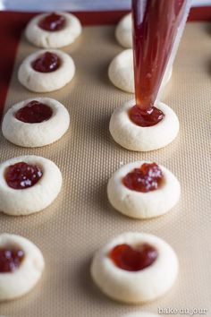 These Strawberry Jam Thumbprint Cookies are so fun to make! It's a super simple recipe, and you can fill it with whatever you like. I'd recommend keeping this one in your back pocket! #thumbprintcookies #fruitycookies #dessert #sweets | bakedujour.com Handmade Home Decor Ideas Crafts, Handmade Home Decor Ideas, Dairy Free Cookie Recipe, Fruity Cookies, Jam Thumbprint Cookies, Thumbprint Cookies Recipe, Easy Christmas Cookie Recipes, Desserts Cake, Dessert Recipies