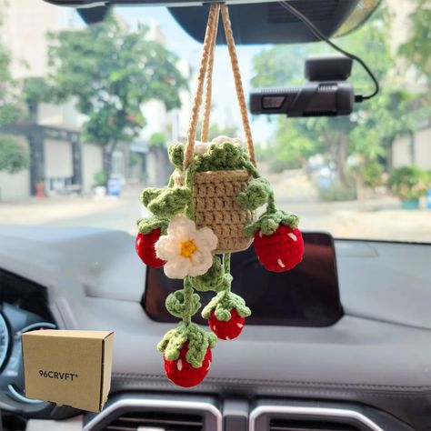 PRICES MAY VARY. 🍀【Handcrafted Crochet Hanging Plant for Car】: This entirely handcrafted crochet hanging plant is designed for car decoration, specifically for hanging on your car's rearview mirror. It adds a touch of vibrancy to your car's interior, creating a cheerful driving experience. 🍀【Safe and User-Friendly Design】: Measuring 7 inches in length and 2.5 inches in width, this crochet hanging plant is easy to adjust and won't hinder your view while driving. Crafted from lightweight yarn co Gifts For Her Car, Crochet Dashboard Accessories, Crochet Rearview Mirror Plant, Crochet Car Mat, Crochet Car Freshener Pattern, Cottagecore Car Accessories, Car Fall Decor, Life Hack Gadgets, Studio Ghibli Car Decor