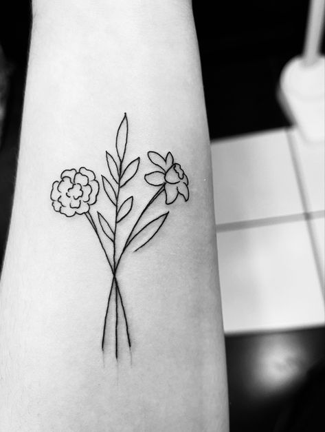 #marigoldtattoo #daffodiltattoo #tattoo #simpletattoo #finelinetattoo #birthmonthtattoo #prettytattoos Simple Marigold Flower Tattoo, Simplistic Daffodil Tattoo, Marigold And Daffodil Flower Tattoo, Marigold Daffodil Tattoo, Daffodil Simple Tattoo, Marigold Minimalist Tattoo, Marigold Simple Tattoo, Dafodill Flowers Tattoo Simple, Simple Marigold Tattoo Outline